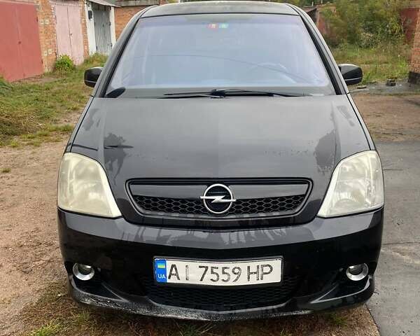 Чорний Опель Меріва, об'ємом двигуна 1.6 л та пробігом 261 тис. км за 5700 $, фото 1 на Automoto.ua