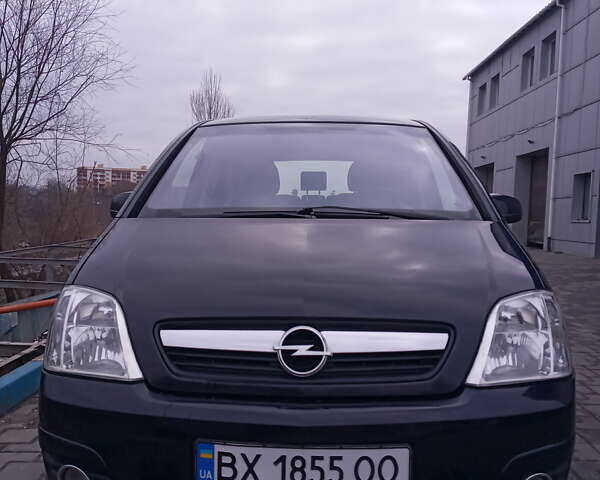 Черный Опель Мерива, объемом двигателя 1.2 л и пробегом 205 тыс. км за 6500 $, фото 1 на Automoto.ua