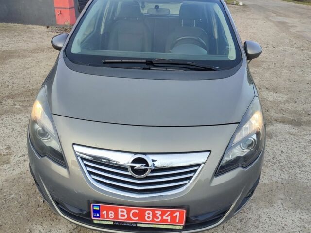Коричневый Опель Мерива, объемом двигателя 1.4 л и пробегом 140 тыс. км за 5898 $, фото 1 на Automoto.ua