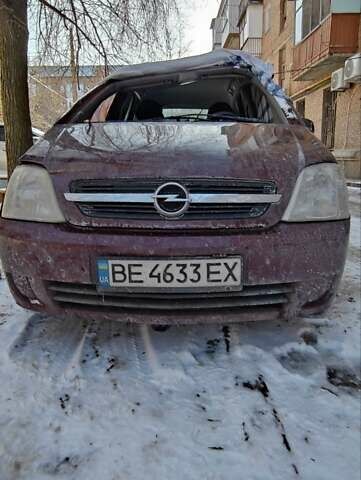Красный Опель Мерива, объемом двигателя 1.6 л и пробегом 200 тыс. км за 1500 $, фото 1 на Automoto.ua