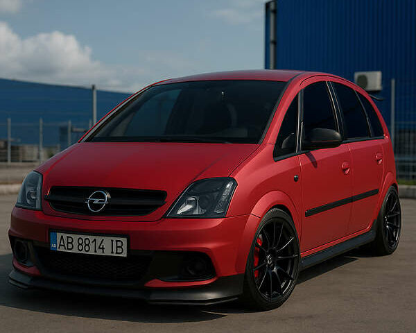 Красный Опель Мерива, объемом двигателя 1.6 л и пробегом 274 тыс. км за 3000 $, фото 1 на Automoto.ua