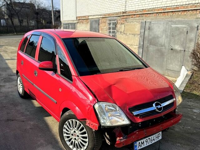 Красный Опель Мерива, объемом двигателя 1.7 л и пробегом 300 тыс. км за 2700 $, фото 1 на Automoto.ua