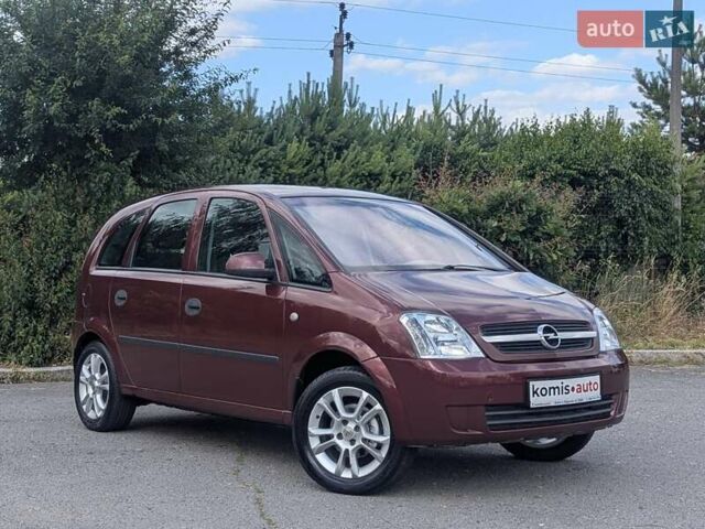 Красный Опель Мерива, объемом двигателя 1.4 л и пробегом 210 тыс. км за 4199 $, фото 1 на Automoto.ua