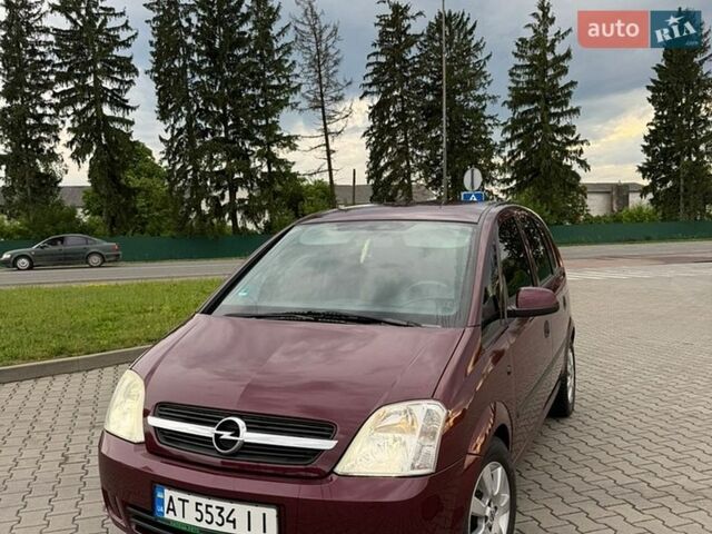 Красный Опель Мерива, объемом двигателя 1.6 л и пробегом 241 тыс. км за 3850 $, фото 1 на Automoto.ua