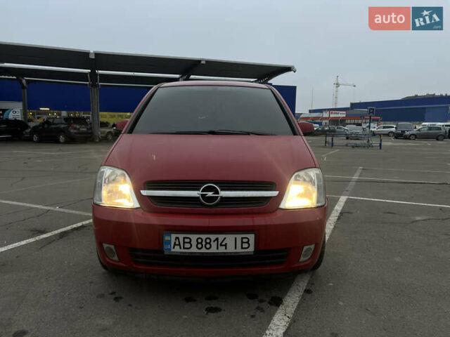 Красный Опель Мерива, объемом двигателя 1.6 л и пробегом 268 тыс. км за 2500 $, фото 1 на Automoto.ua
