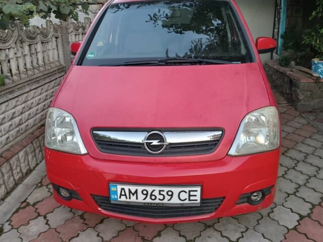 Красный Опель Мерива, объемом двигателя 1.6 л и пробегом 235 тыс. км за 3800 $, фото 1 на Automoto.ua