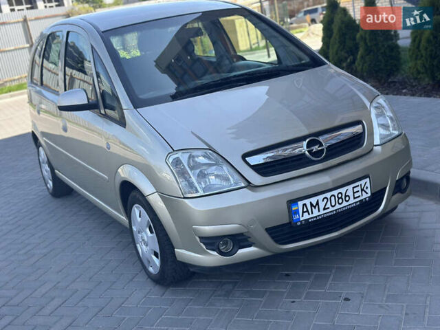 Желтый Опель Мерива, объемом двигателя 1.6 л и пробегом 173 тыс. км за 4550 $, фото 1 на Automoto.ua