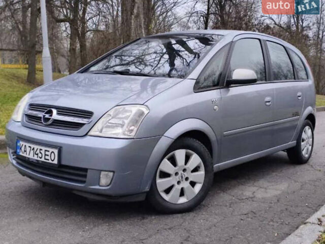 Серый Опель Мерива, объемом двигателя 1.6 л и пробегом 158 тыс. км за 4299 $, фото 1 на Automoto.ua