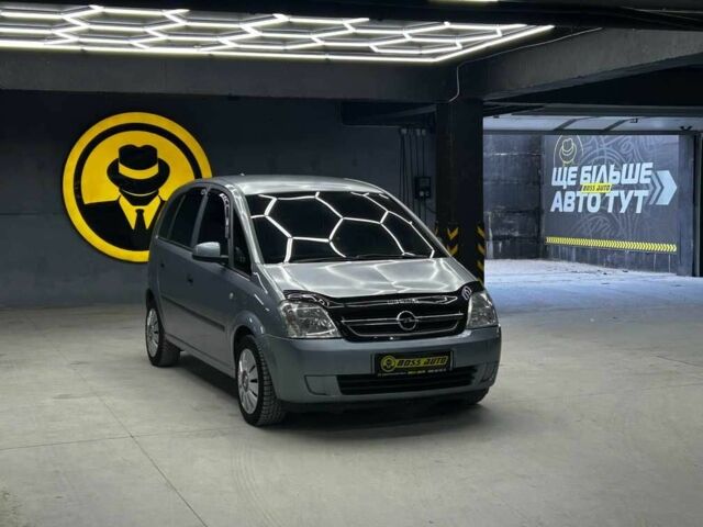 Серый Опель Мерива, объемом двигателя 1.6 л и пробегом 282 тыс. км за 4800 $, фото 1 на Automoto.ua