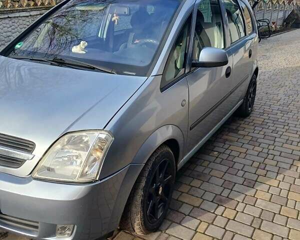 Серый Опель Мерива, объемом двигателя 1.6 л и пробегом 244 тыс. км за 4000 $, фото 1 на Automoto.ua