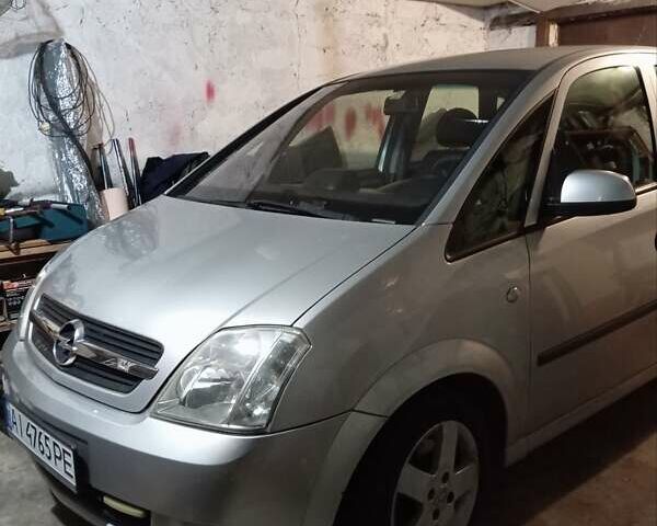 Серый Опель Мерива, объемом двигателя 1.7 л и пробегом 310 тыс. км за 3800 $, фото 1 на Automoto.ua