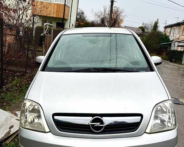 Серый Опель Мерива, объемом двигателя 1.25 л и пробегом 204 тыс. км за 4200 $, фото 1 на Automoto.ua