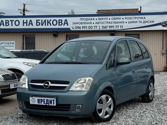 Серый Опель Мерива, объемом двигателя 1.6 л и пробегом 243 тыс. км за 4750 $, фото 1 на Automoto.ua