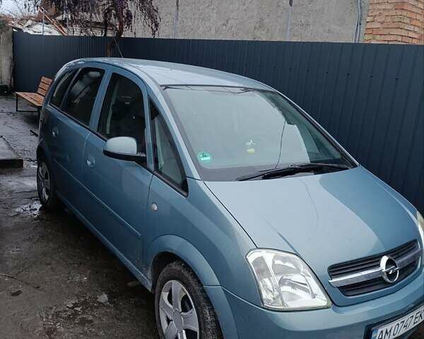 Серый Опель Мерива, объемом двигателя 1.6 л и пробегом 243 тыс. км за 4500 $, фото 1 на Automoto.ua