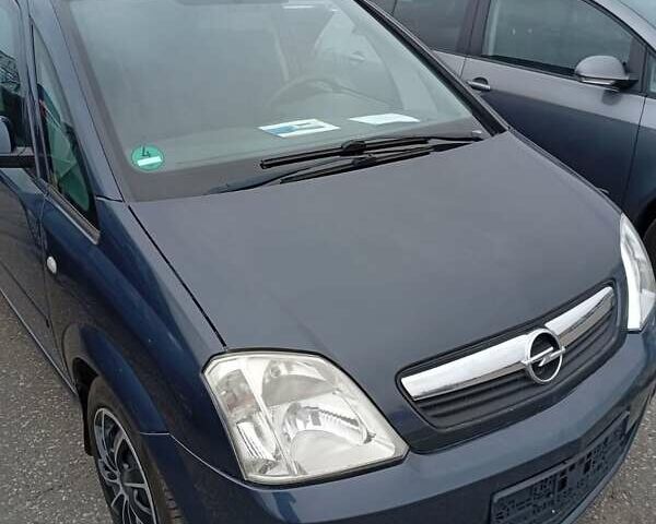 Серый Опель Мерива, объемом двигателя 1.6 л и пробегом 166 тыс. км за 4900 $, фото 1 на Automoto.ua