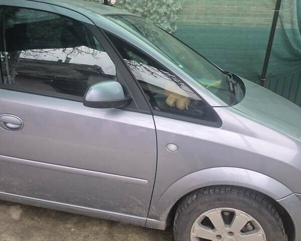 Серый Опель Мерива, объемом двигателя 1.6 л и пробегом 180 тыс. км за 5964 $, фото 1 на Automoto.ua