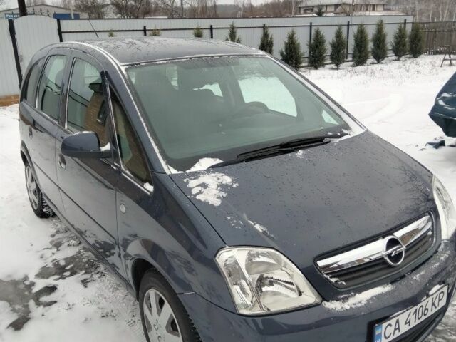 Серый Опель Мерива, объемом двигателя 1.6 л и пробегом 215 тыс. км за 4900 $, фото 1 на Automoto.ua