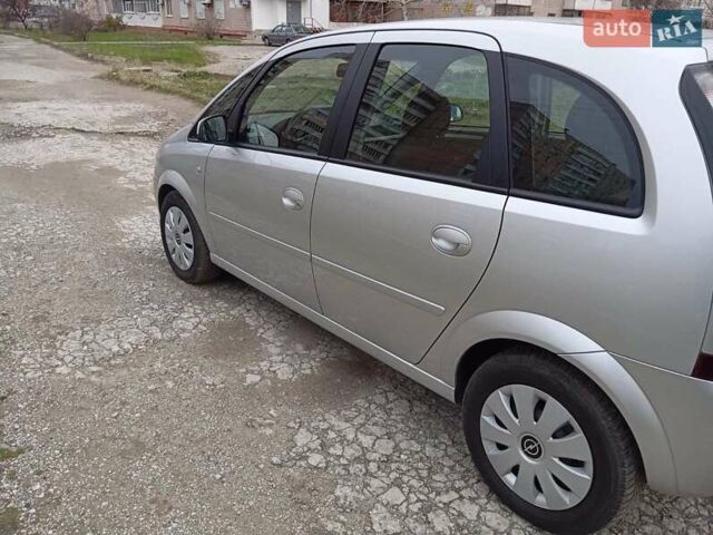 Серый Опель Мерива, объемом двигателя 1.6 л и пробегом 200 тыс. км за 6350 $, фото 1 на Automoto.ua