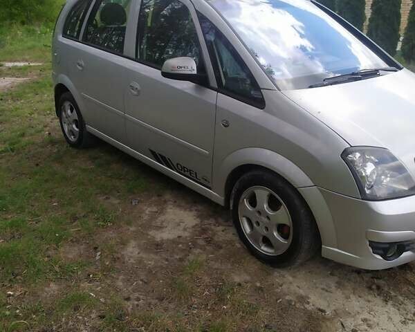 Серый Опель Мерива, объемом двигателя 1.2 л и пробегом 270 тыс. км за 3300 $, фото 1 на Automoto.ua