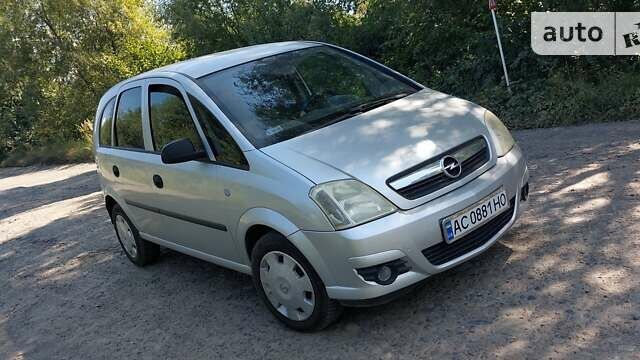Серый Опель Мерива, объемом двигателя 1.69 л и пробегом 210 тыс. км за 4800 $, фото 1 на Automoto.ua