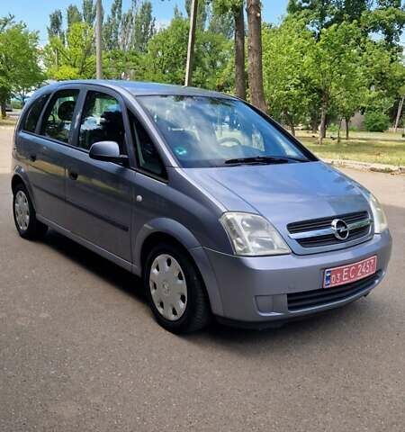 Серый Опель Мерива, объемом двигателя 1.6 л и пробегом 206 тыс. км за 4800 $, фото 1 на Automoto.ua