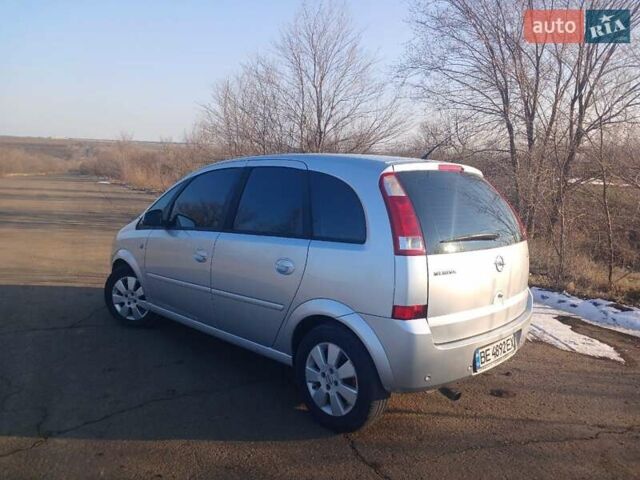 Серый Опель Мерива, объемом двигателя 1.8 л и пробегом 210 тыс. км за 4500 $, фото 1 на Automoto.ua
