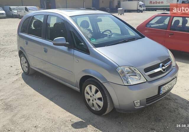 Серый Опель Мерива, объемом двигателя 1.6 л и пробегом 237 тыс. км за 4100 $, фото 1 на Automoto.ua