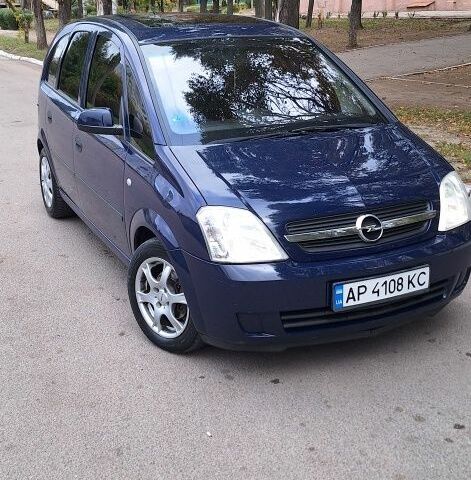 Синий Опель Мерива, объемом двигателя 1.6 л и пробегом 185 тыс. км за 4099 $, фото 1 на Automoto.ua