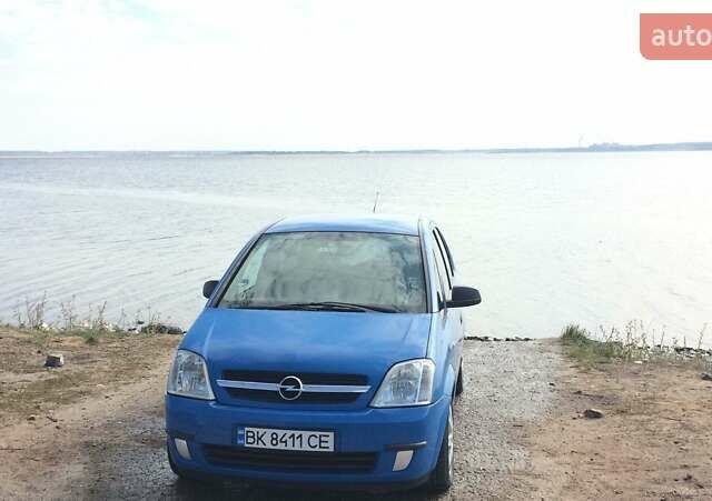 Синий Опель Мерива, объемом двигателя 1.6 л и пробегом 287 тыс. км за 4000 $, фото 1 на Automoto.ua