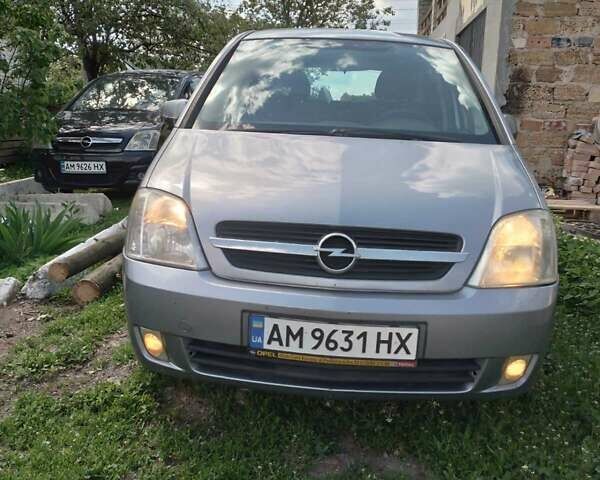 Синий Опель Мерива, объемом двигателя 1.8 л и пробегом 160 тыс. км за 3200 $, фото 1 на Automoto.ua
