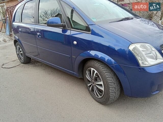 Синий Опель Мерива, объемом двигателя 1.6 л и пробегом 160 тыс. км за 3690 $, фото 1 на Automoto.ua