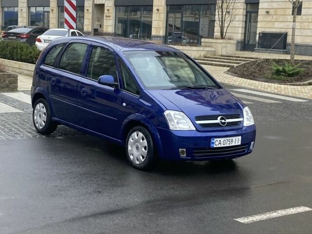 Синий Опель Мерива, объемом двигателя 1.3 л и пробегом 300 тыс. км за 2900 $, фото 1 на Automoto.ua