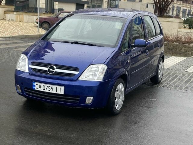 Синий Опель Мерива, объемом двигателя 1.2 л и пробегом 400 тыс. км за 3200 $, фото 1 на Automoto.ua