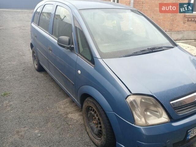 Синий Опель Мерива, объемом двигателя 1.25 л и пробегом 260 тыс. км за 2100 $, фото 1 на Automoto.ua