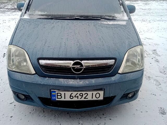 Синий Опель Мерива, объемом двигателя 1.6 л и пробегом 239 тыс. км за 4850 $, фото 1 на Automoto.ua