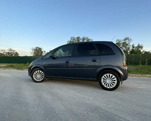 Синий Опель Мерива, объемом двигателя 1.69 л и пробегом 262 тыс. км за 3550 $, фото 1 на Automoto.ua