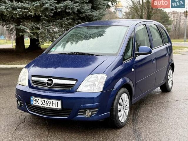 Синий Опель Мерива, объемом двигателя 1.6 л и пробегом 142 тыс. км за 3950 $, фото 1 на Automoto.ua