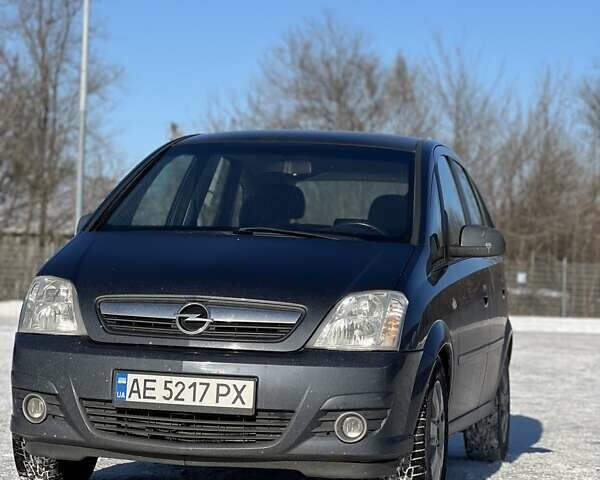 Синий Опель Мерива, объемом двигателя 1.25 л и пробегом 187 тыс. км за 5500 $, фото 1 на Automoto.ua