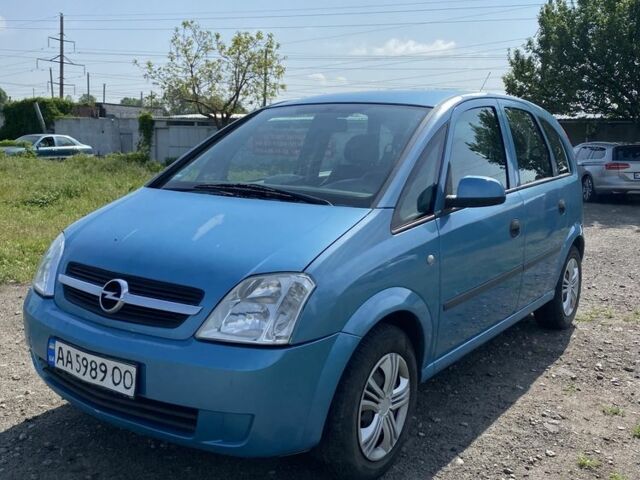 Синий Опель Мерива, объемом двигателя 1.6 л и пробегом 255 тыс. км за 3100 $, фото 1 на Automoto.ua