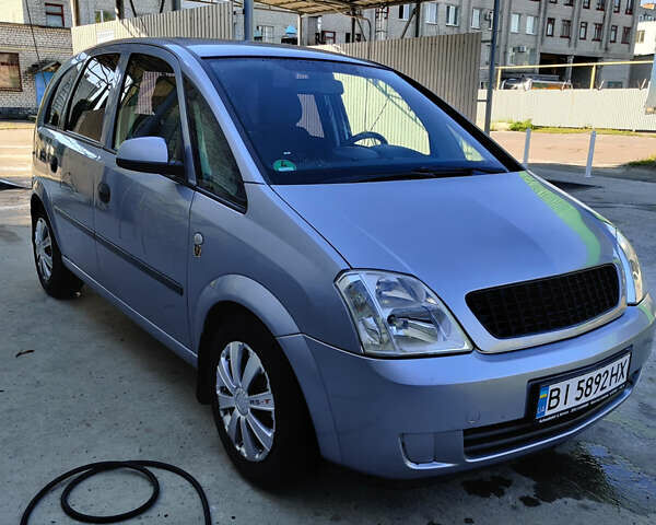 Синий Опель Мерива, объемом двигателя 1.6 л и пробегом 296 тыс. км за 3600 $, фото 1 на Automoto.ua
