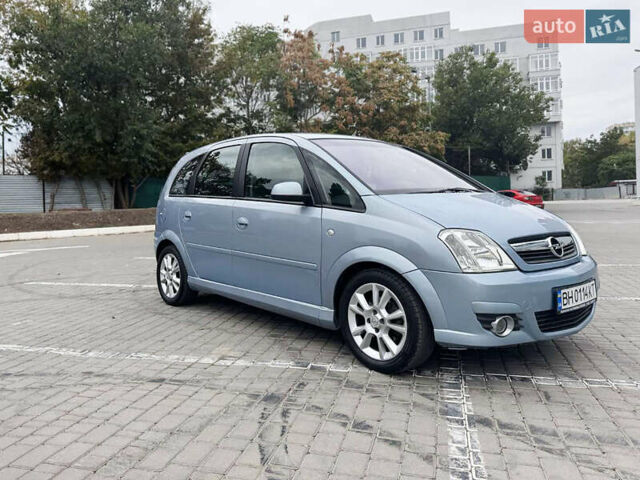 Синий Опель Мерива, объемом двигателя 1.6 л и пробегом 196 тыс. км за 5700 $, фото 1 на Automoto.ua
