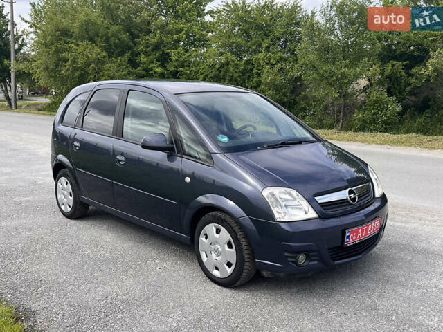 Синий Опель Мерива, объемом двигателя 1.4 л и пробегом 214 тыс. км за 4950 $, фото 1 на Automoto.ua