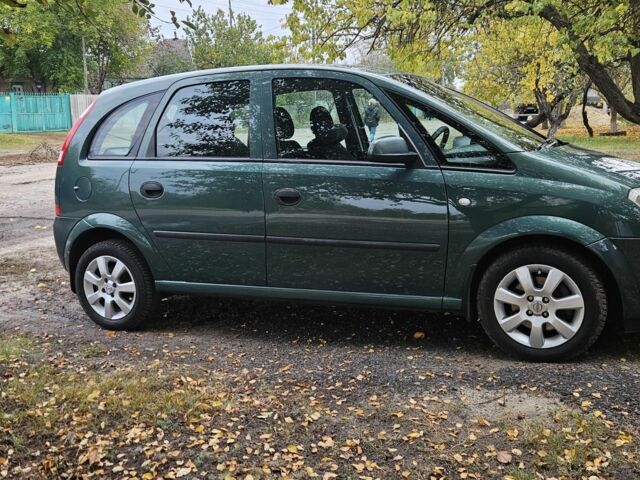 Зеленый Опель Мерива, объемом двигателя 1.6 л и пробегом 320 тыс. км за 5500 $, фото 1 на Automoto.ua