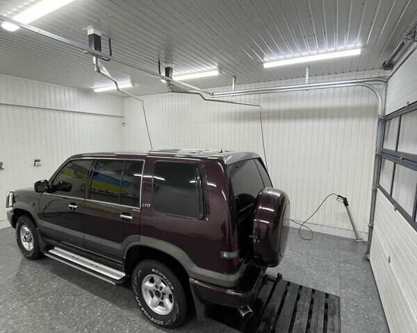 Червоний Опель Монтерей, об'ємом двигуна 3.1 л та пробігом 250 тис. км за 9000 $, фото 1 на Automoto.ua