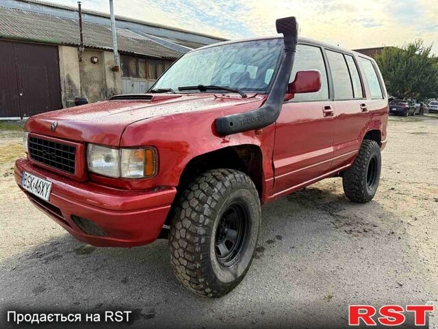 Красный Опель Монтерей, объемом двигателя 3.1 л и пробегом 266 тыс. км за 2800 $, фото 1 на Automoto.ua