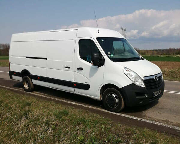Белый Опель Movano, объемом двигателя 2.3 л и пробегом 409 тыс. км за 12000 $, фото 1 на Automoto.ua