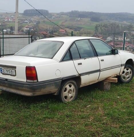 Білий Опель OPC, об'ємом двигуна 2 л та пробігом 605 тис. км за 24 $, фото 1 на Automoto.ua