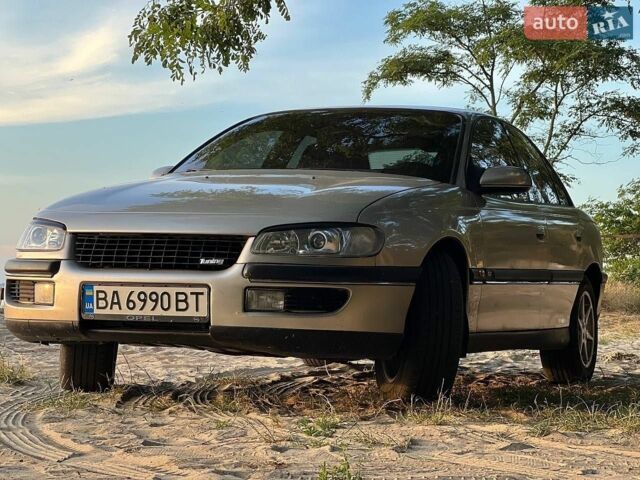 Бежевий Опель Омега, об'ємом двигуна 2 л та пробігом 270 тис. км за 3500 $, фото 1 на Automoto.ua