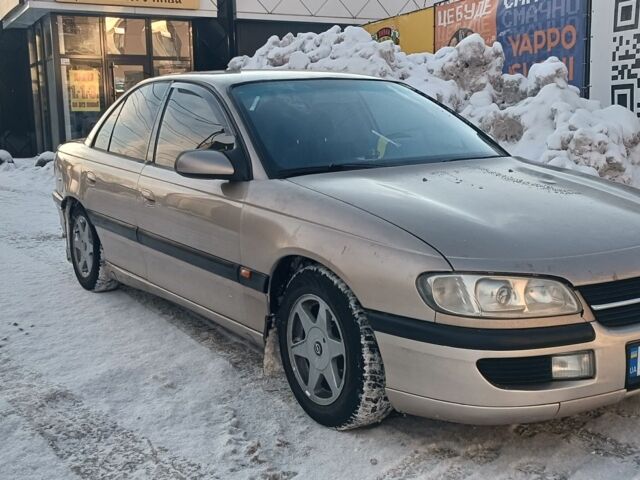 Бежевий Опель Омега, об'ємом двигуна 2 л та пробігом 257 тис. км за 3300 $, фото 1 на Automoto.ua