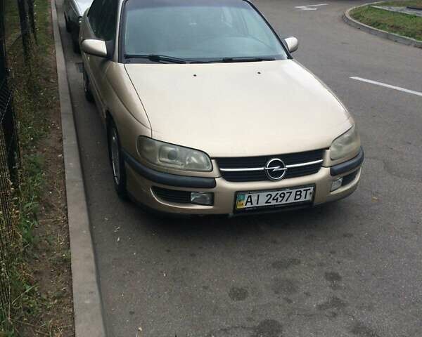 Бежевый Опель Омега, объемом двигателя 2.5 л и пробегом 260 тыс. км за 1700 $, фото 1 на Automoto.ua